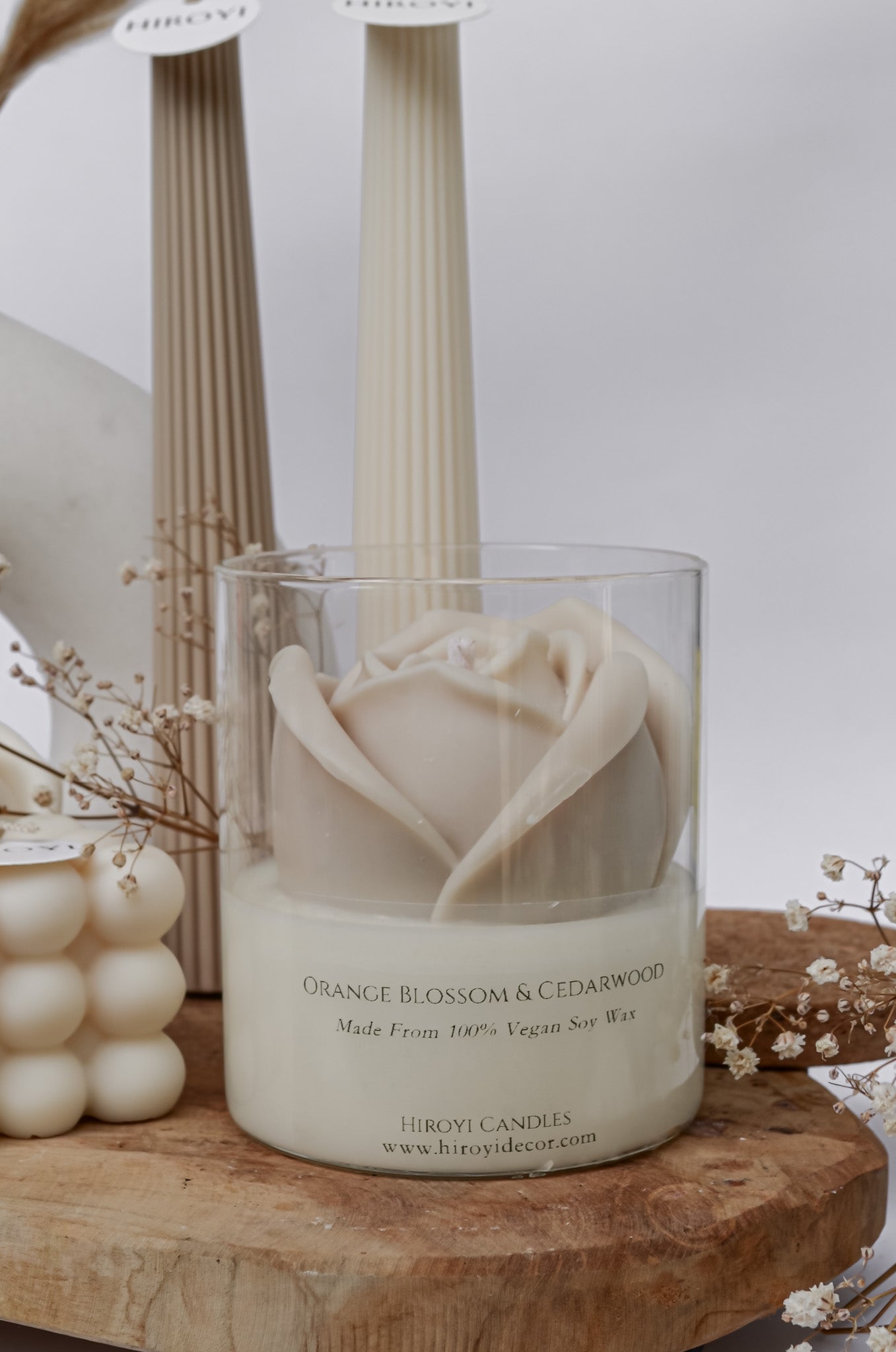 Elegant handmade scented candle with beige rose for wedding favour