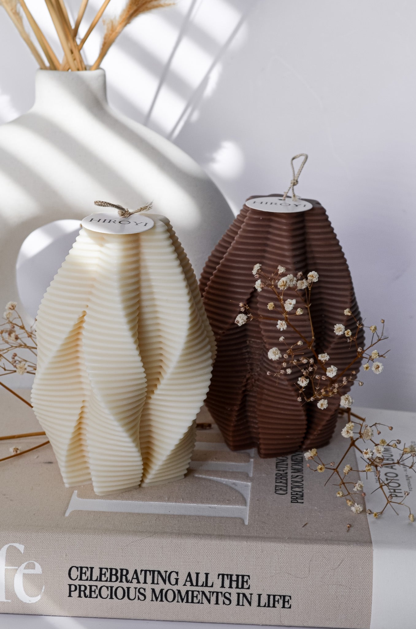 Twisted ribbed coffee table candle in beige ivory and brown colour