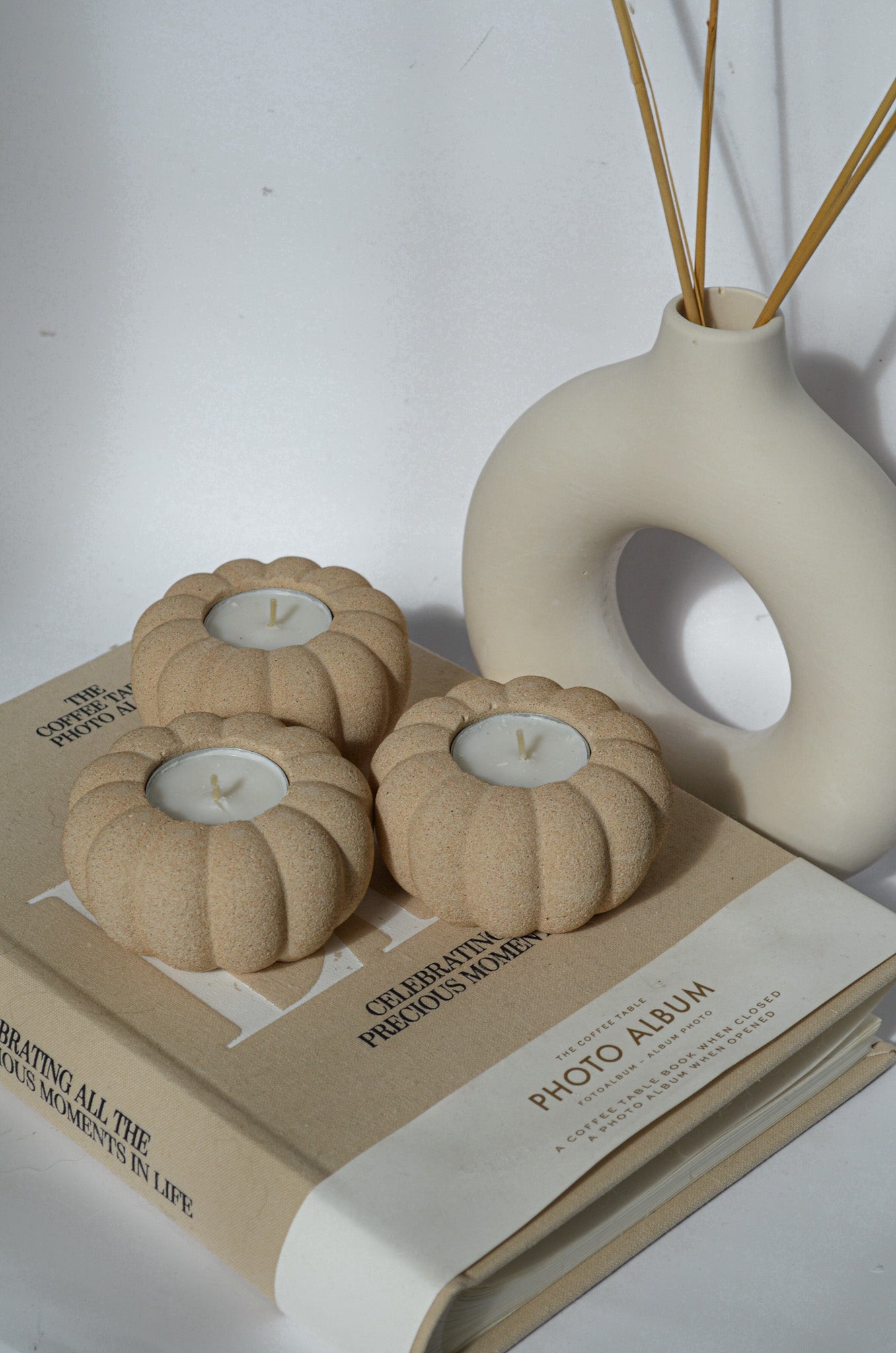 textured pumpkin candle holder earthy colour