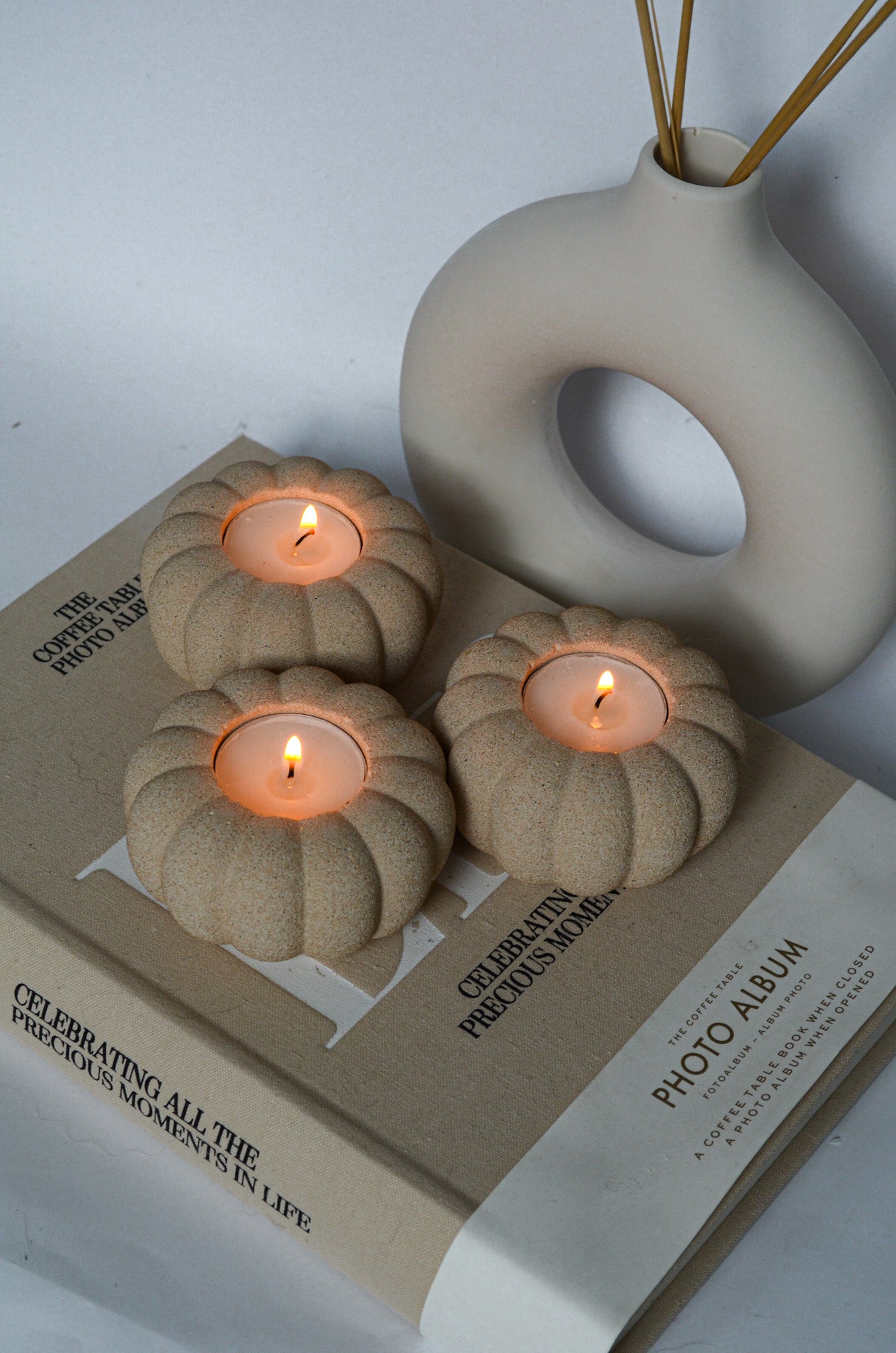 textured pumpkin candle holder earthy colour