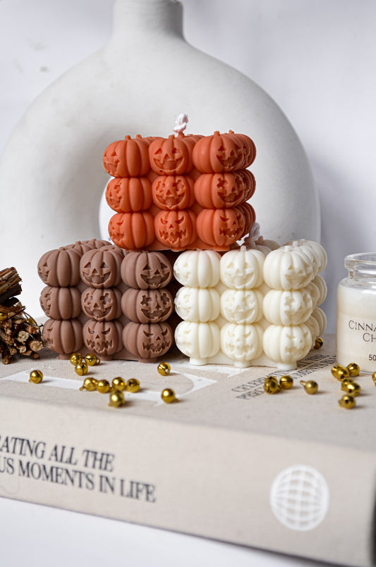 Halloween pumpkin faces candle