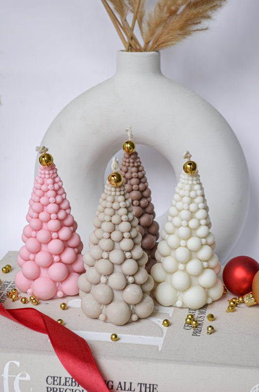 Festive Christmas tree candles with bell on top