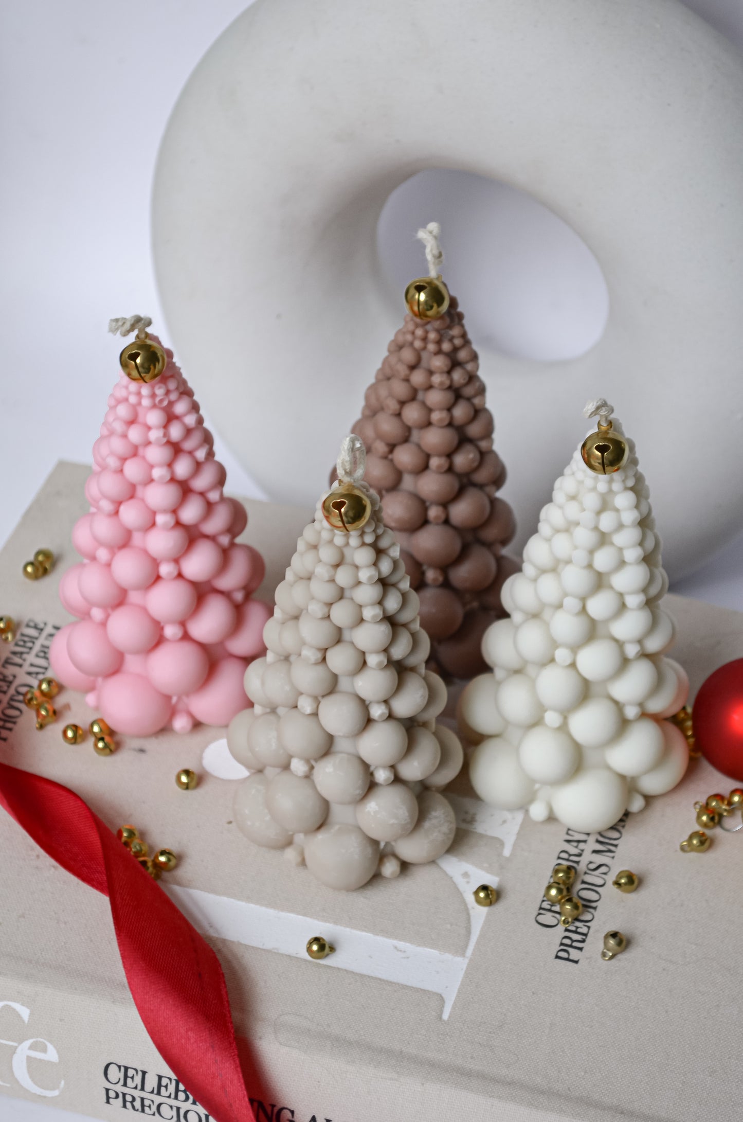 Colourful Christmas tree candles w ith bell on top
